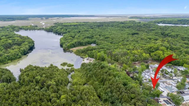 an aerial view of a houses with outdoor space and street view