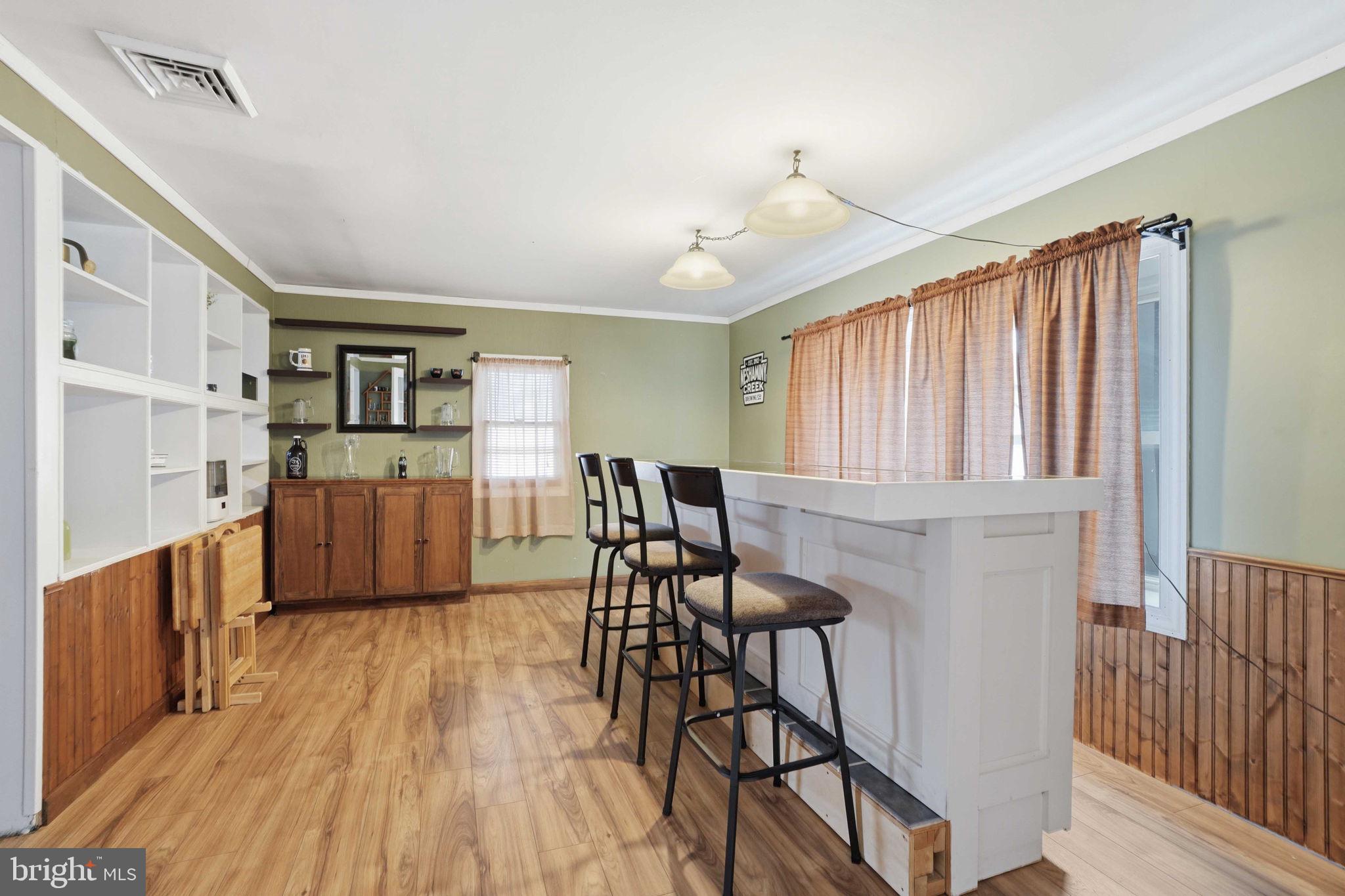 396 Pinewood Drive Levittown, PA 19054 - Photo 13 of 32 a view of a kitchen with furniture and wooden floor