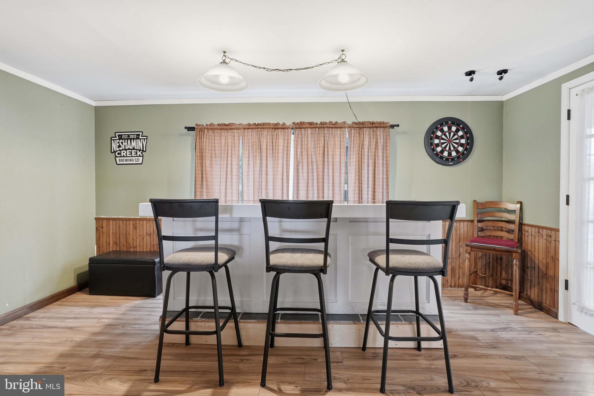 396 Pinewood Drive Levittown, PA 19054 - Photo 14 of 32 a view of a dining room with furniture and wooden floor