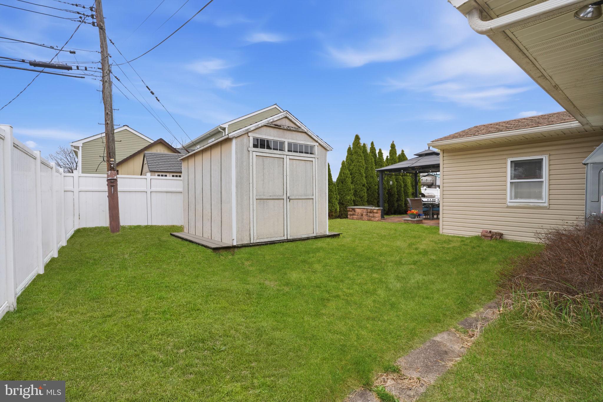 396 Pinewood Drive Levittown, PA 19054 - Photo 27 of 32 a view of a back yard of the house