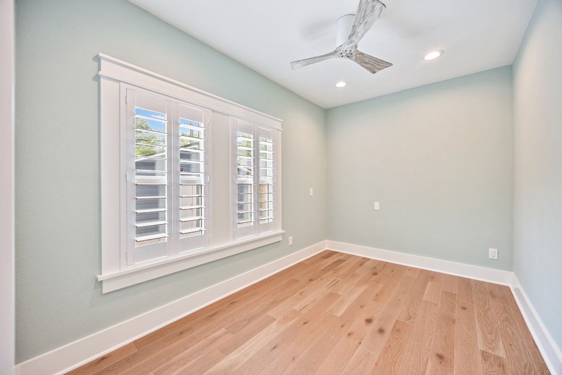 1104 Walton Street Houston, TX 77009 - Photo 16 of 27 A versatile bedroom, ideal for an office or wellness room, awaits at the back of the house.