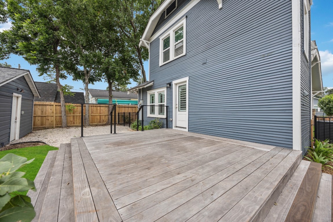 1104 Walton Street Houston, TX 77009 - Photo 23 of 27 The large deck off the back door is entertainment-ready, perfectly blending indoor and outdoor living.