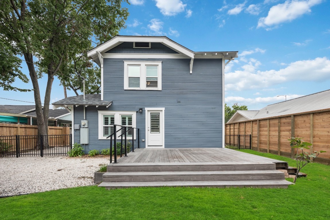 1104 Walton Street Houston, TX 77009 - Photo 25 of 27 A rear view captures the essence of outdoor living with a deck, patio area, and abundant space for personalization.