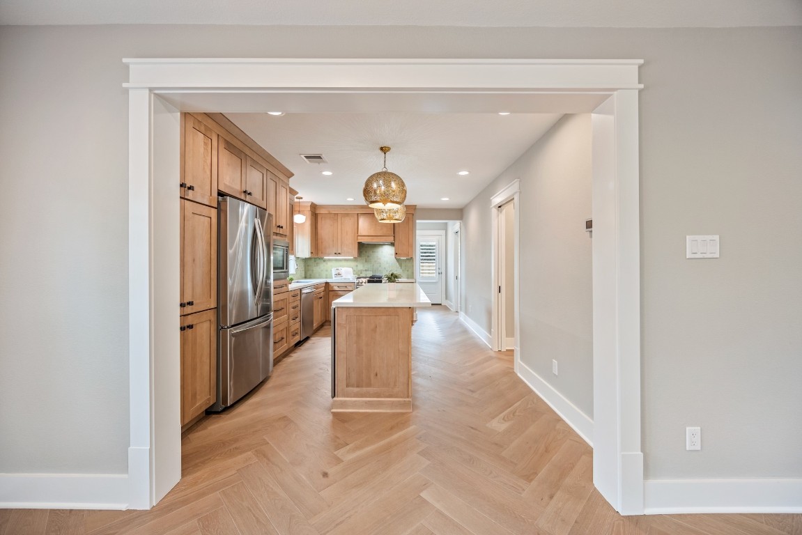 1104 Walton Street Houston, TX 77009 - Photo 6 of 27 Open to dining and living areas, this kitchen is designed for the chef who loves to be part of the conversation.