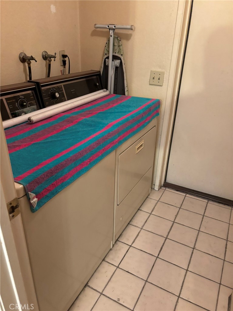 15809 Fallen Leaf Road La Puente, CA 91744 - Photo 11 of 23 a kitchen with a sink and a mirror