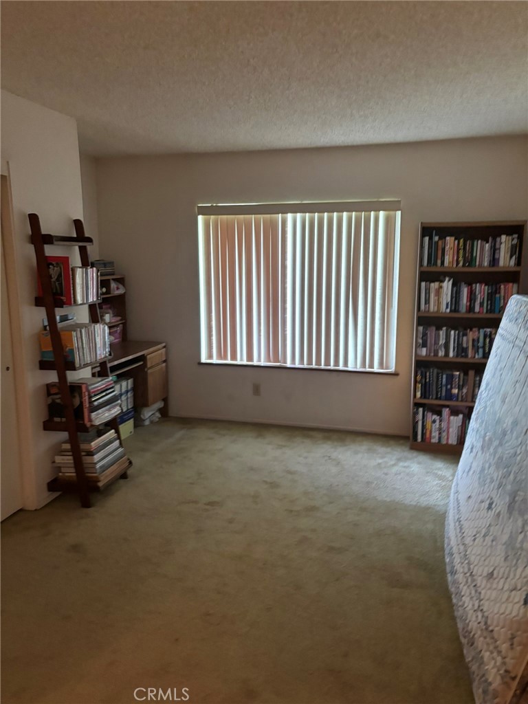 15809 Fallen Leaf Road La Puente, CA 91744 - Photo 19 of 23 an empty room with toys and windows