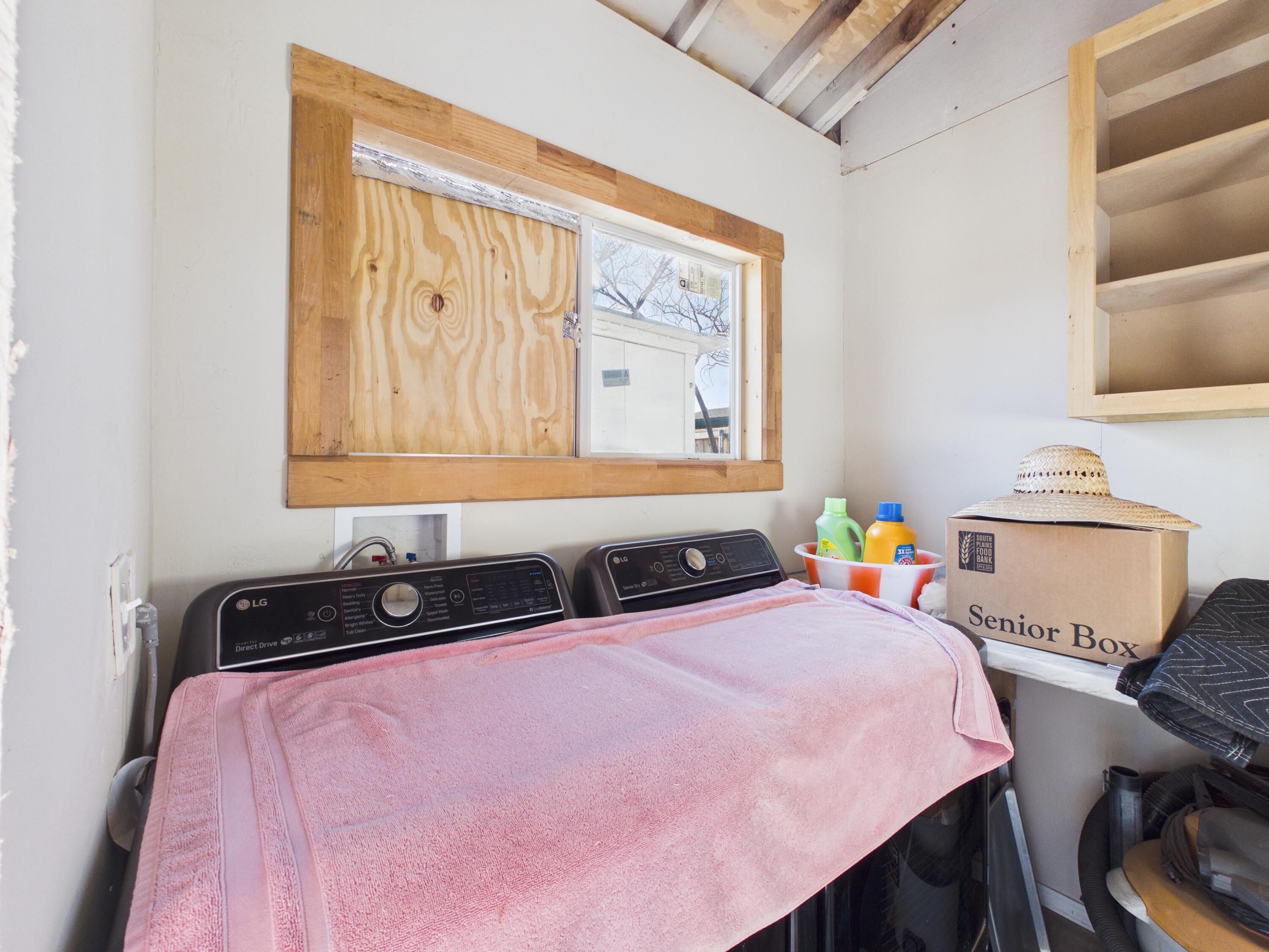 2804 Vanda Avenue Lubbock, TX 79404 - Photo 17 of 23 a bed room with a bed and a chair
