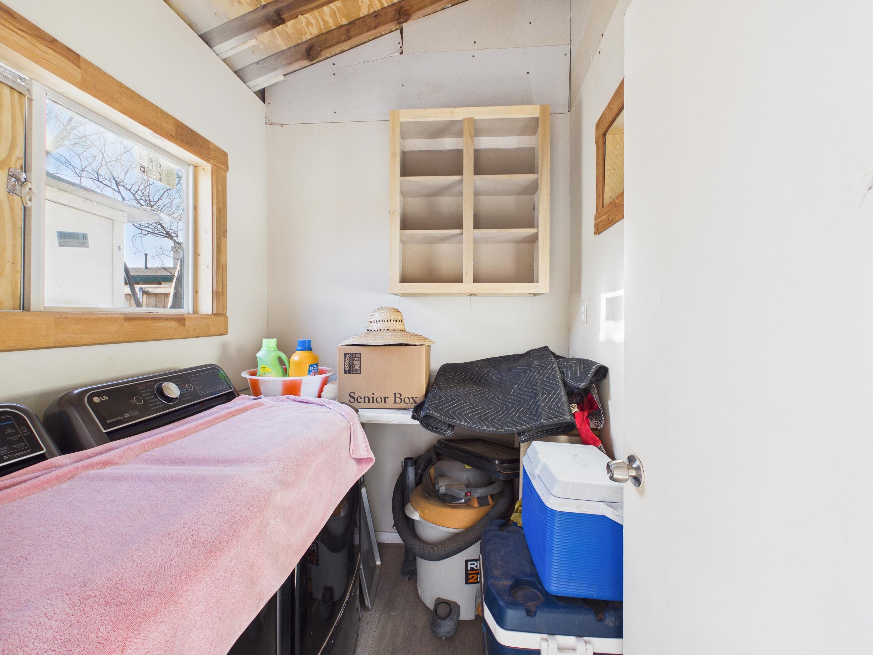 2804 Vanda Avenue Lubbock, TX 79404 - Photo 18 of 23 a bedroom with bed and a window