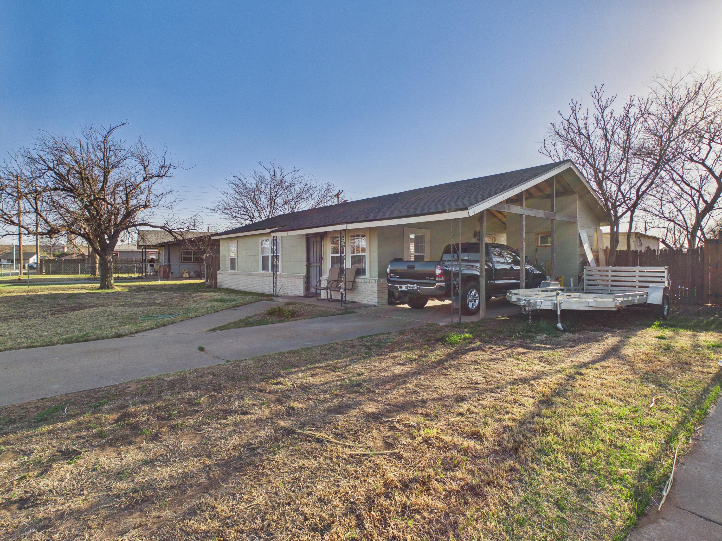 2804 Vanda Avenue Lubbock, TX 79404 - Photo 2 of 23 a view of a house with backyard