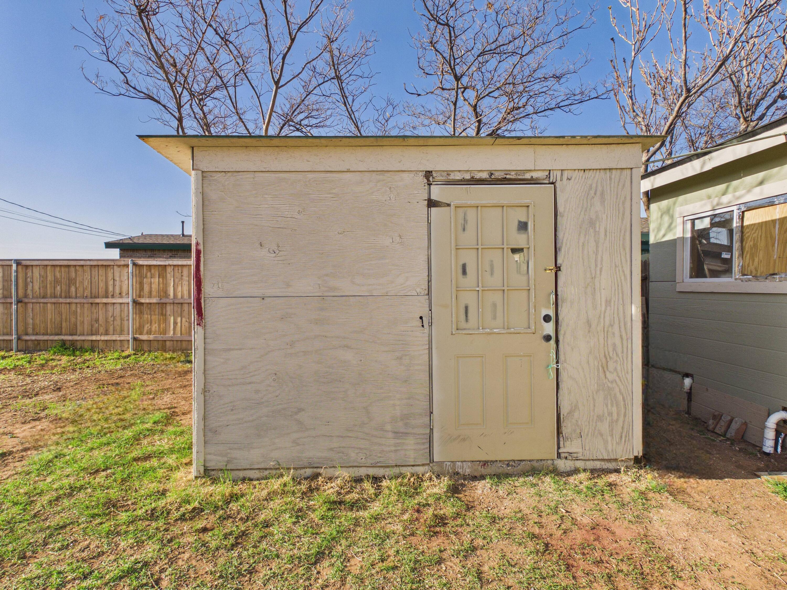 2804 Vanda Avenue Lubbock, TX 79404 - Photo 21 of 23 a view of a wooden door