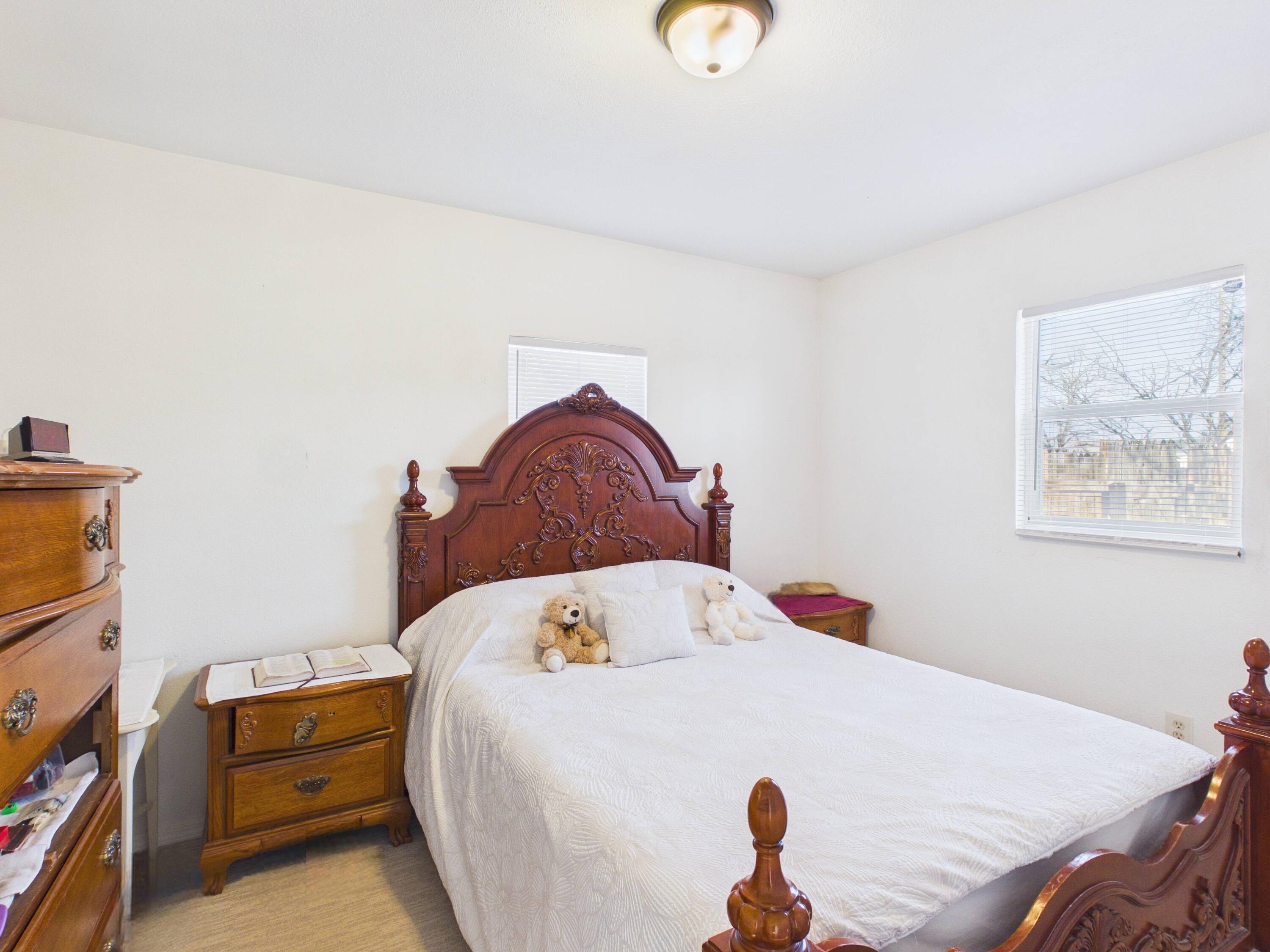 2804 Vanda Avenue Lubbock, TX 79404 - Photo 22 of 23 a bedroom with a bed and a tv