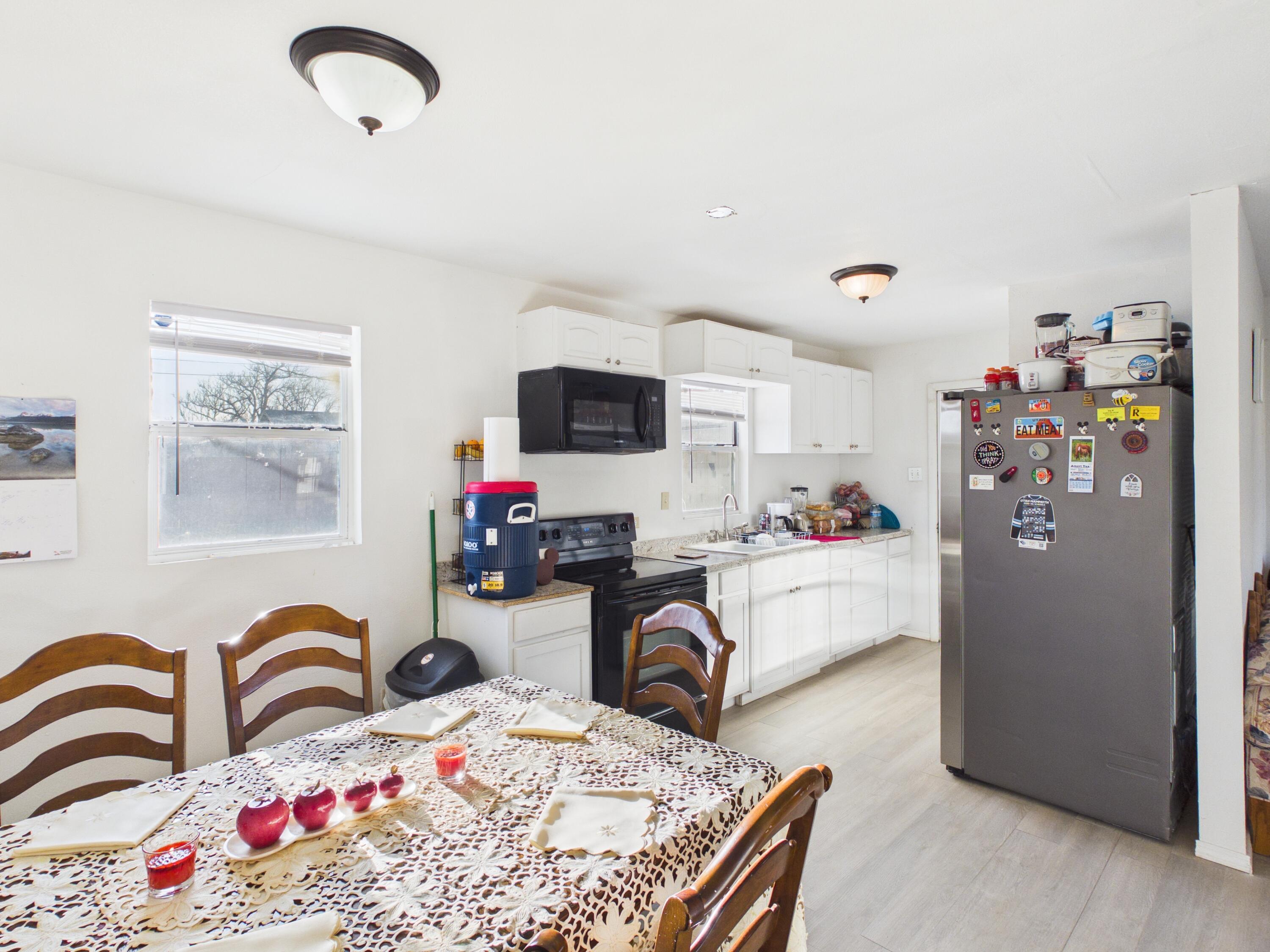 2804 Vanda Avenue Lubbock, TX 79404 - Photo 8 of 23 a living room with furniture gym equipment and a flat screen tv