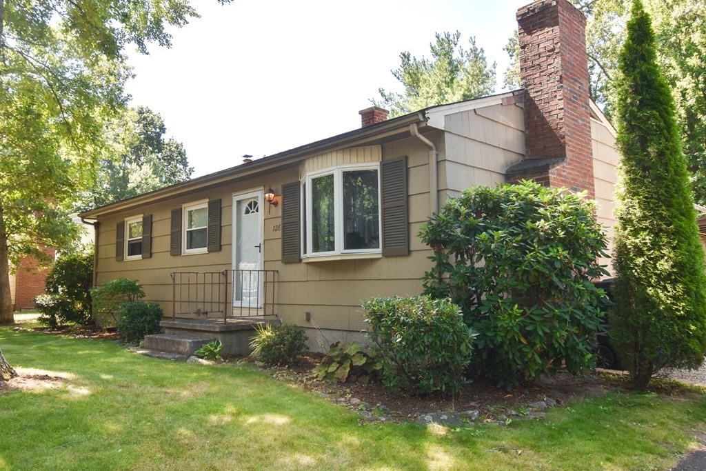 128 Tioga Street Springfield, MA 01128 - Photo 1 of 33 a view of a house with a yard