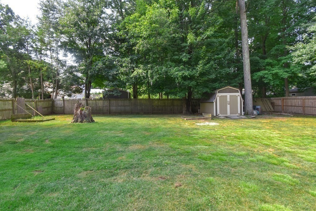 128 Tioga Street Springfield, MA 01128 - Photo 28 of 33 a front view of a house with a yard