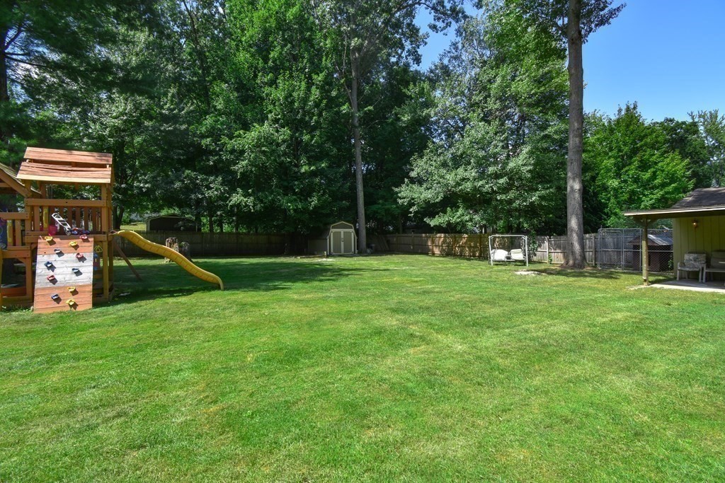 128 Tioga Street Springfield, MA 01128 - Photo 4 of 33 a view of a house with a park