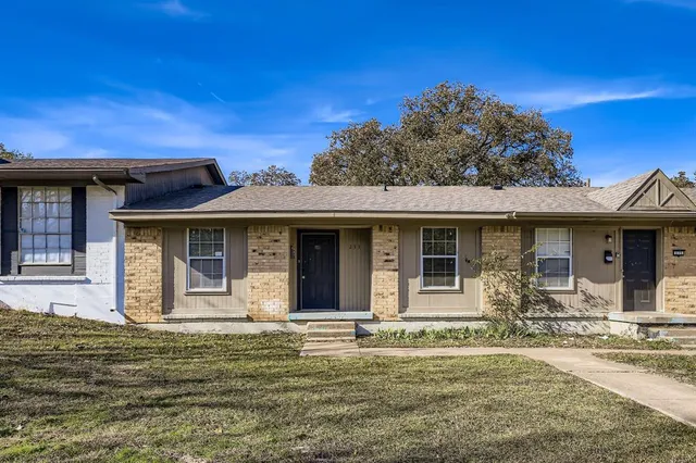 a front view of a house with a porch