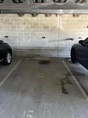 a bathroom with a sink and a shower
