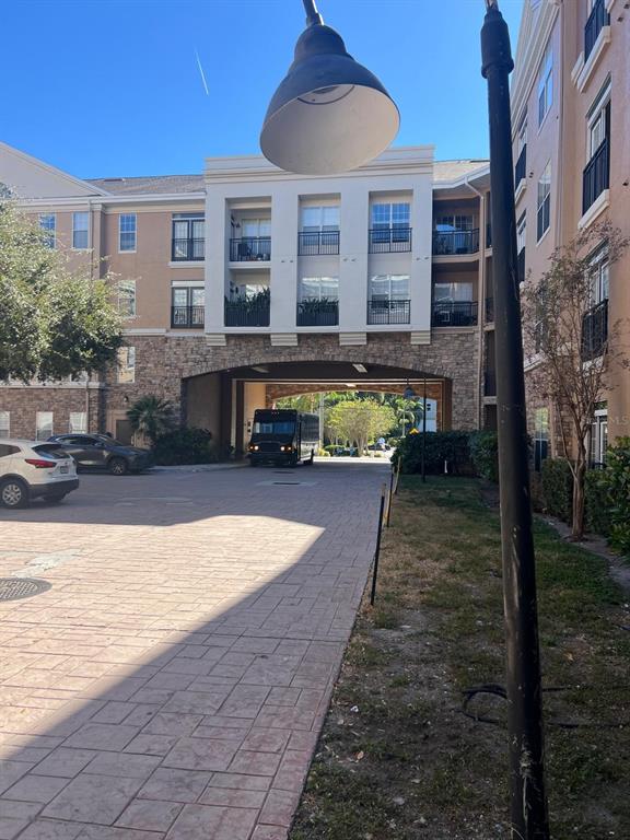 4221 West Spruce Street, Unit 2222 Tampa, FL 33607 - Photo 9 of 25 a view of a house with swimming pool