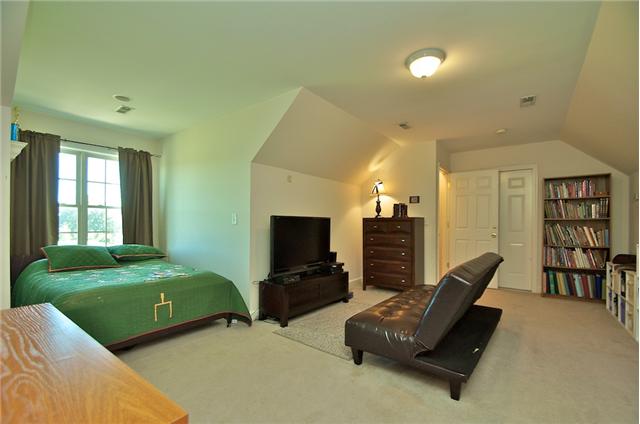 3944 Flewellyn Road Springfield, TN 37172 - Photo 13 of 20 a living room with furniture and a flat screen tv