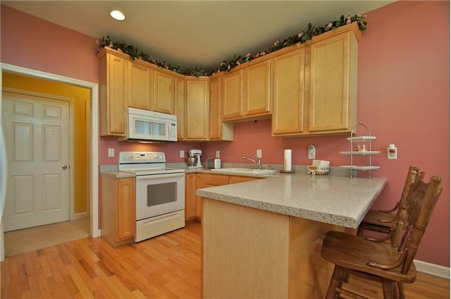 3944 Flewellyn Road Springfield, TN 37172 - Photo 5 of 20 a kitchen with a sink appliances and cabinets