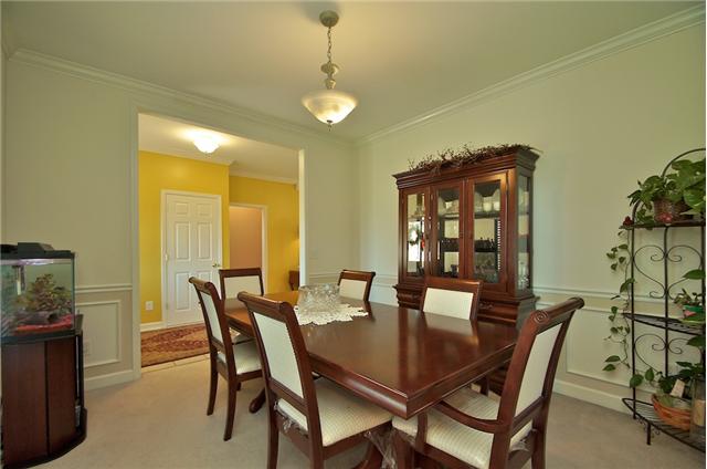 3944 Flewellyn Road Springfield, TN 37172 - Photo 8 of 20 a view of a dining room with furniture and window