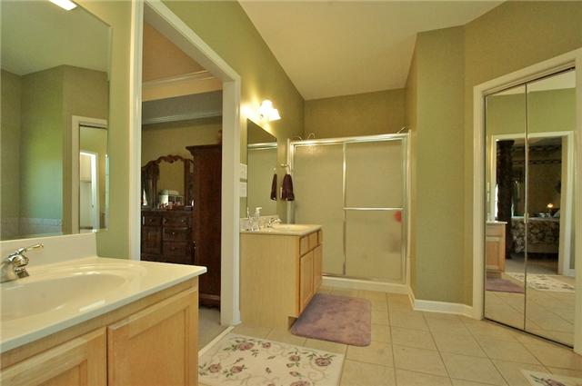 3944 Flewellyn Road Springfield, TN 37172 - Photo 10 of 20 a bathroom with a sink a toilet and shower