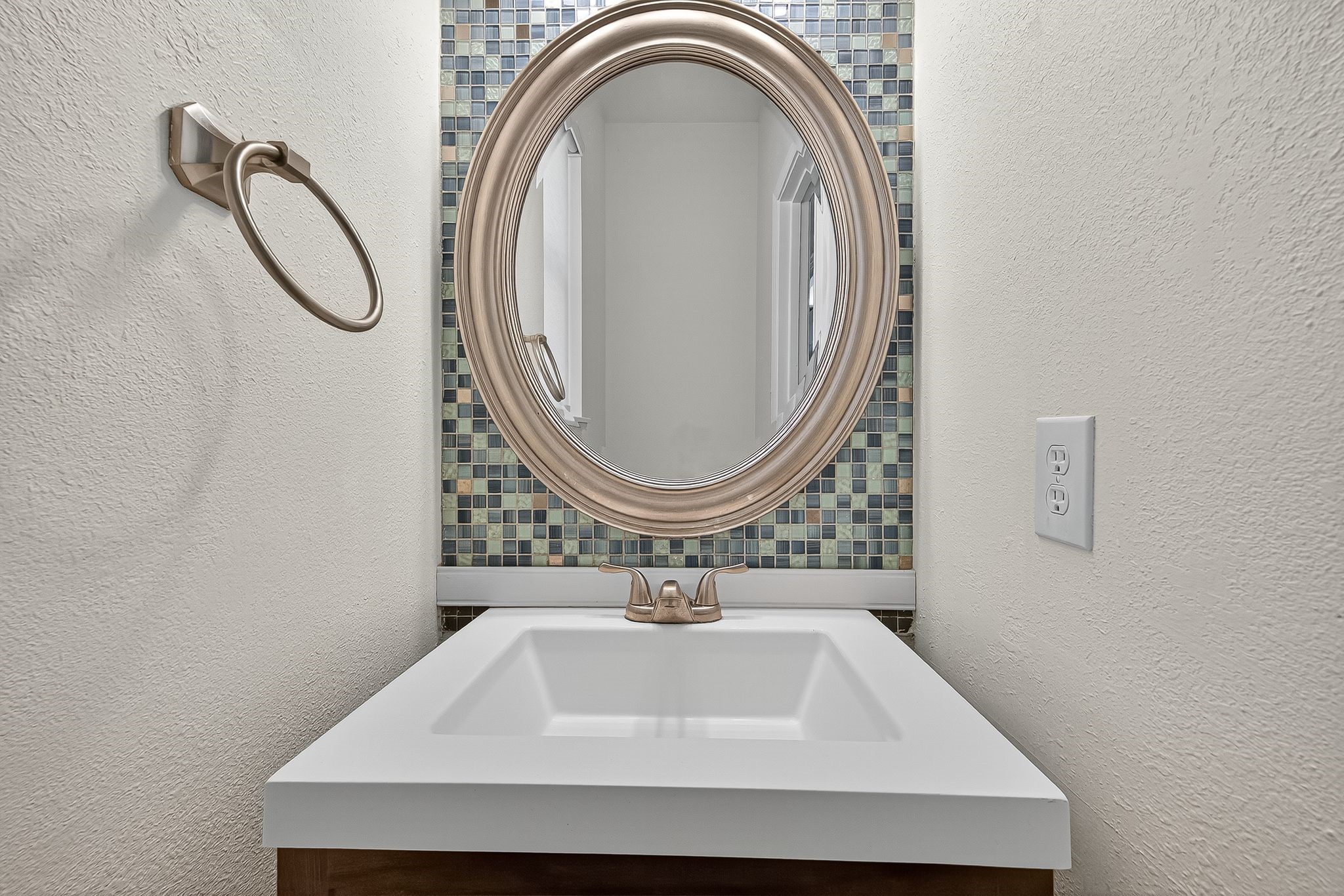 22406 Piper Terrace Lane Katy, TX 77450 - Photo 26 of 44 a bathroom with a sink and a mirror