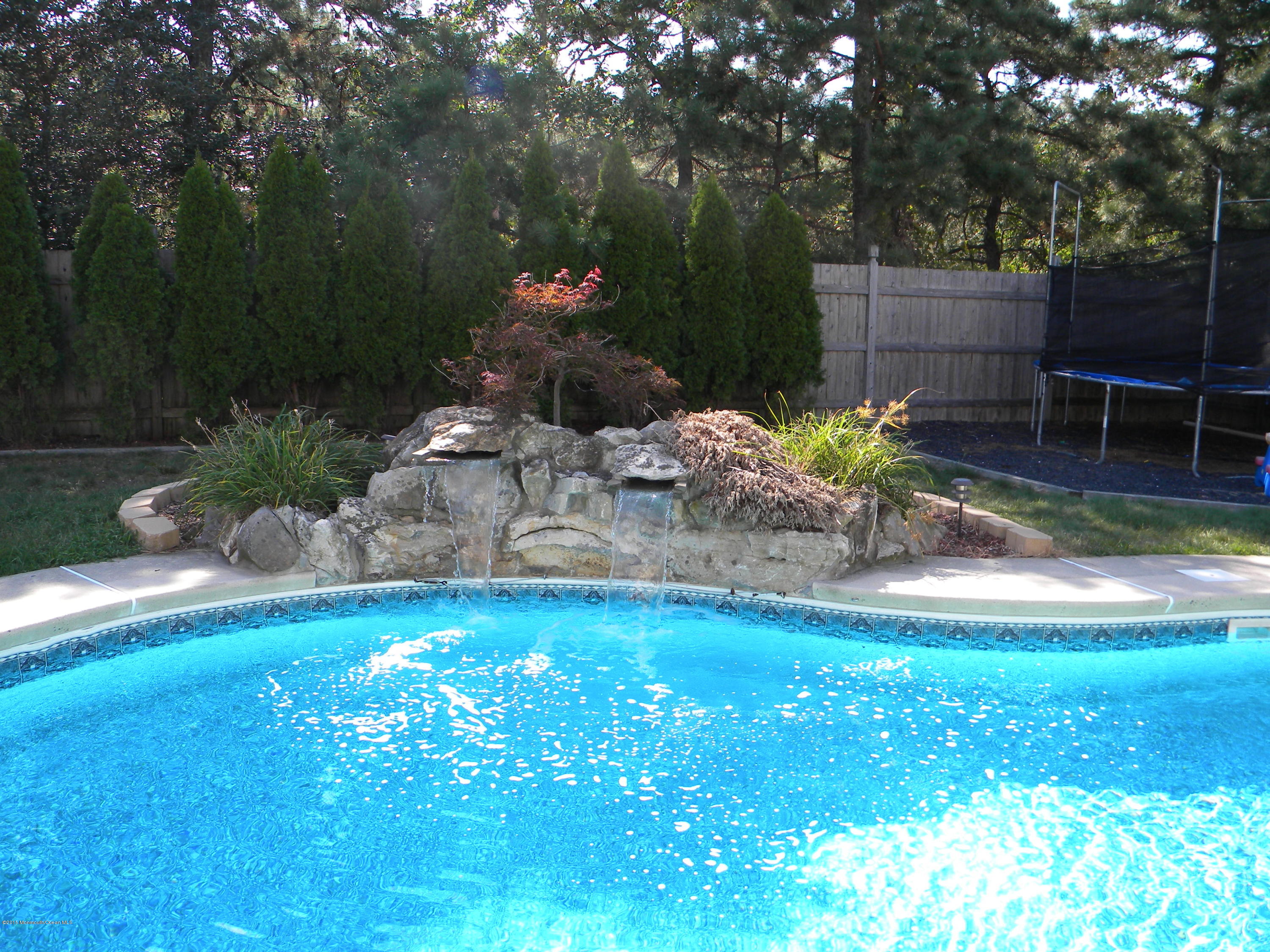 124 Gaff Road Manahawkin, NJ 08050 - Photo 35 of 36 Pool waterfall