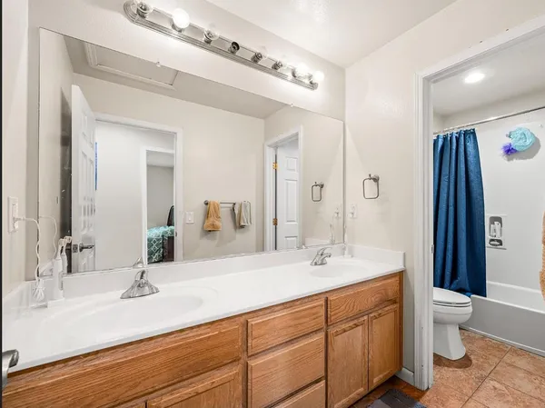 a bathroom with a shower and a bathtub