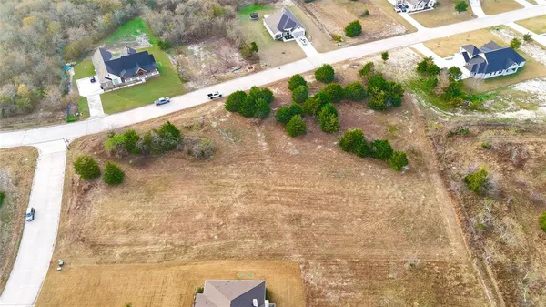 a view of a yard with an outdoor space