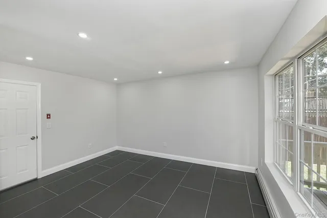 a view of hallway with windows