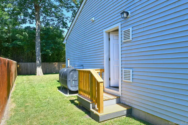 a view of kitchen with cabinets and stainless steel appliances