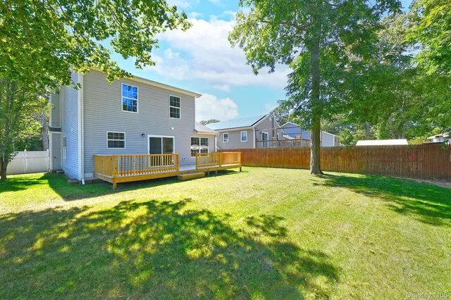 a view of a house with a large window