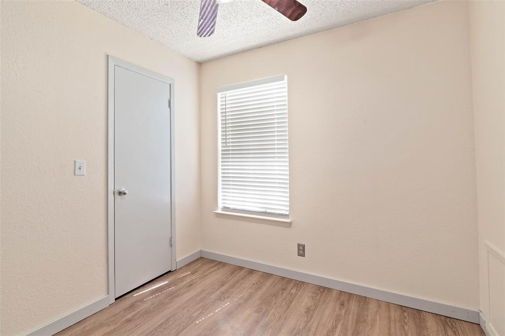 700 West Collins Street Denton, TX 76201 - Photo 28 of 36 2nd of three upstairs bedrooms