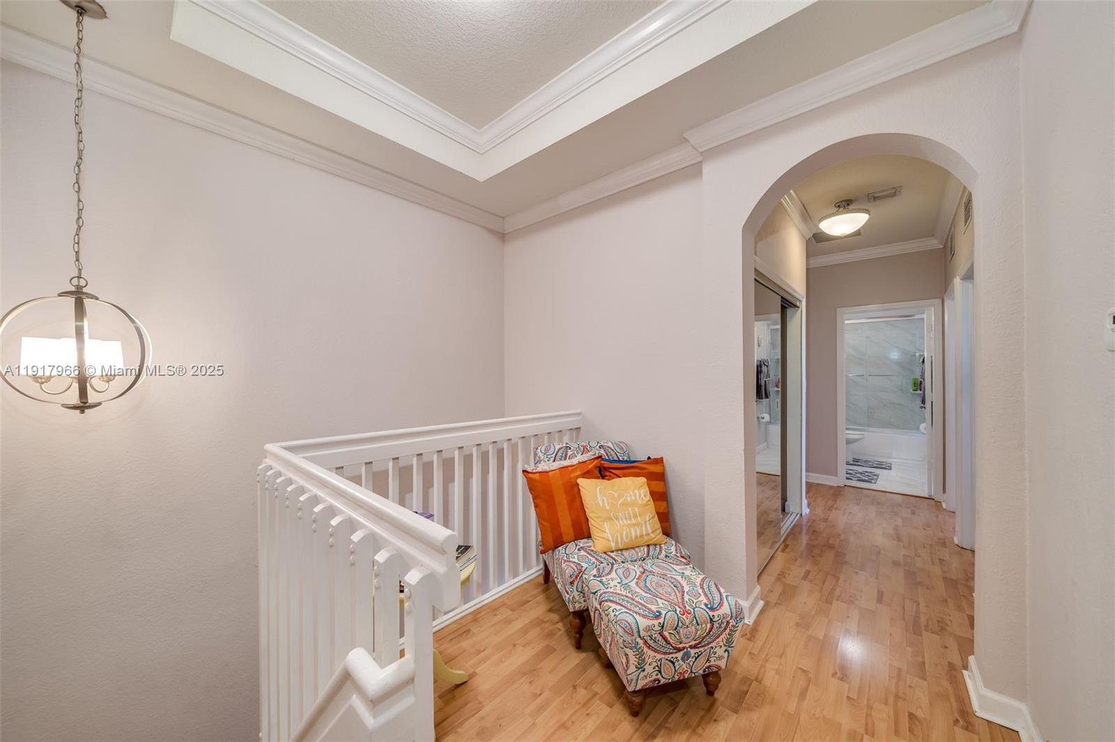 15242 Southwest 8th Way Miami, FL 33194 - Photo 21 of 62 a bedroom with a bed and wooden floor