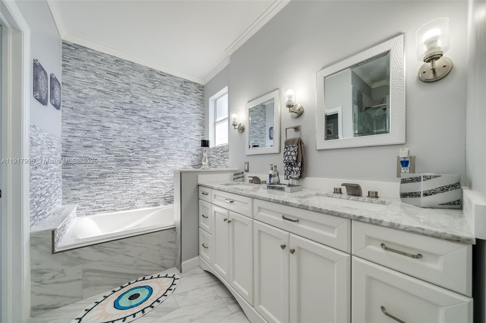 15242 Southwest 8th Way Miami, FL 33194 - Photo 29 of 62 a bathroom with a granite countertop sink vanity mirror next to a window