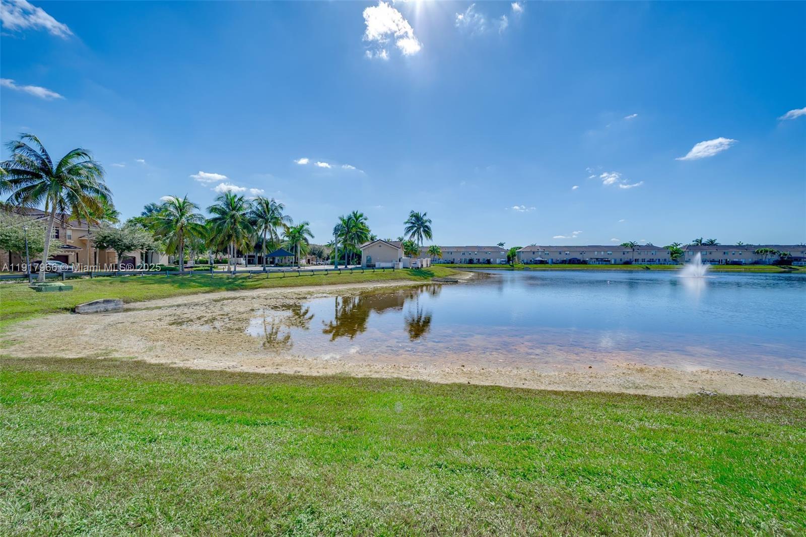 15242 Southwest 8th Way Miami, FL 33194 - Photo 45 of 62 a view of a lake with houses in the back