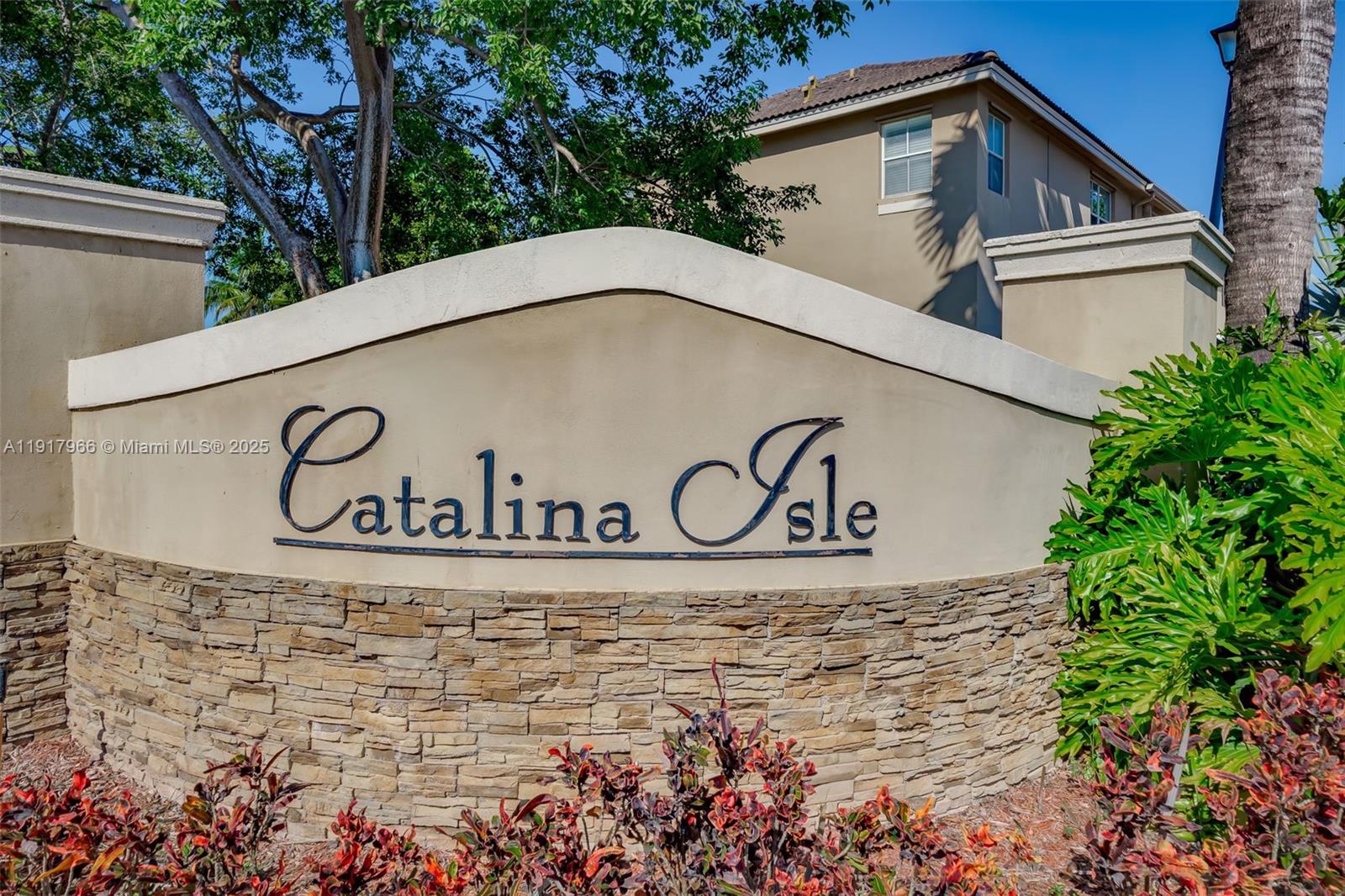 15242 Southwest 8th Way Miami, FL 33194 - Photo 51 of 62 a white house that has a sign on it