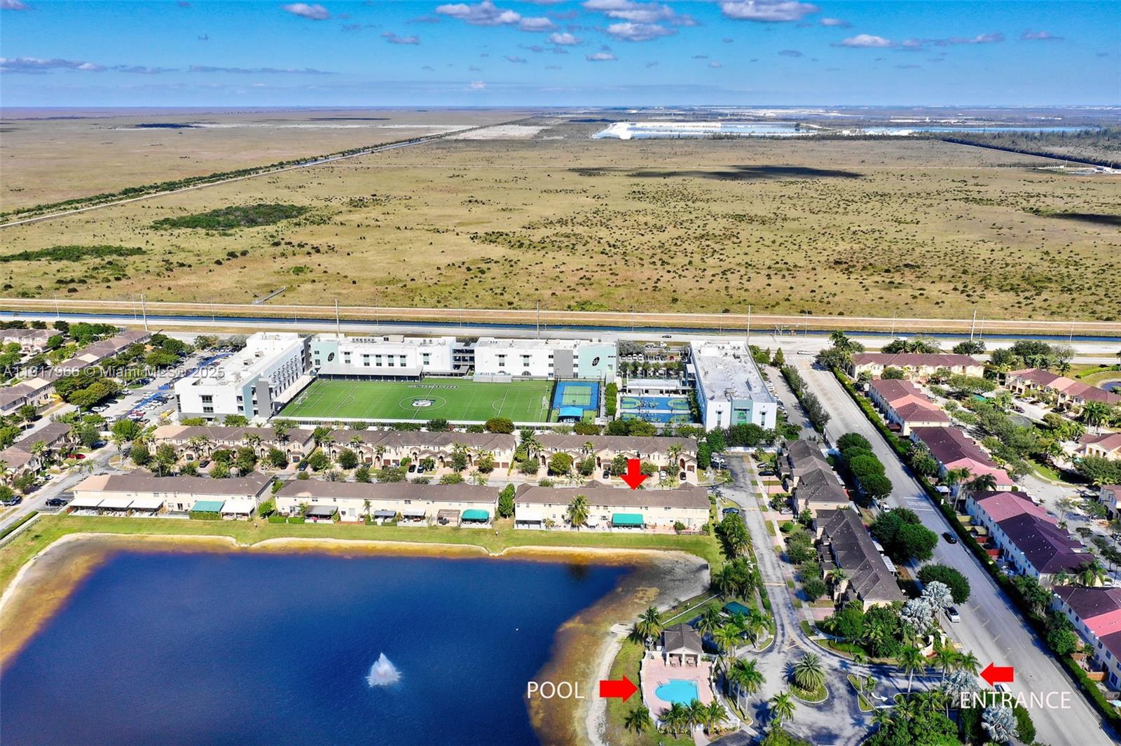15242 Southwest 8th Way Miami, FL 33194 - Photo 55 of 62 a view of water heater room with wooden floor