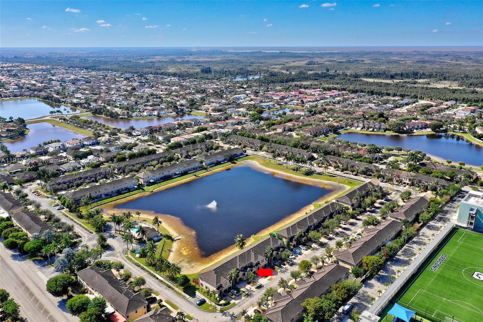 15242 Southwest 8th Way Miami, FL 33194 - Photo 60 of 62 an aerial view of a pool an ocean view
