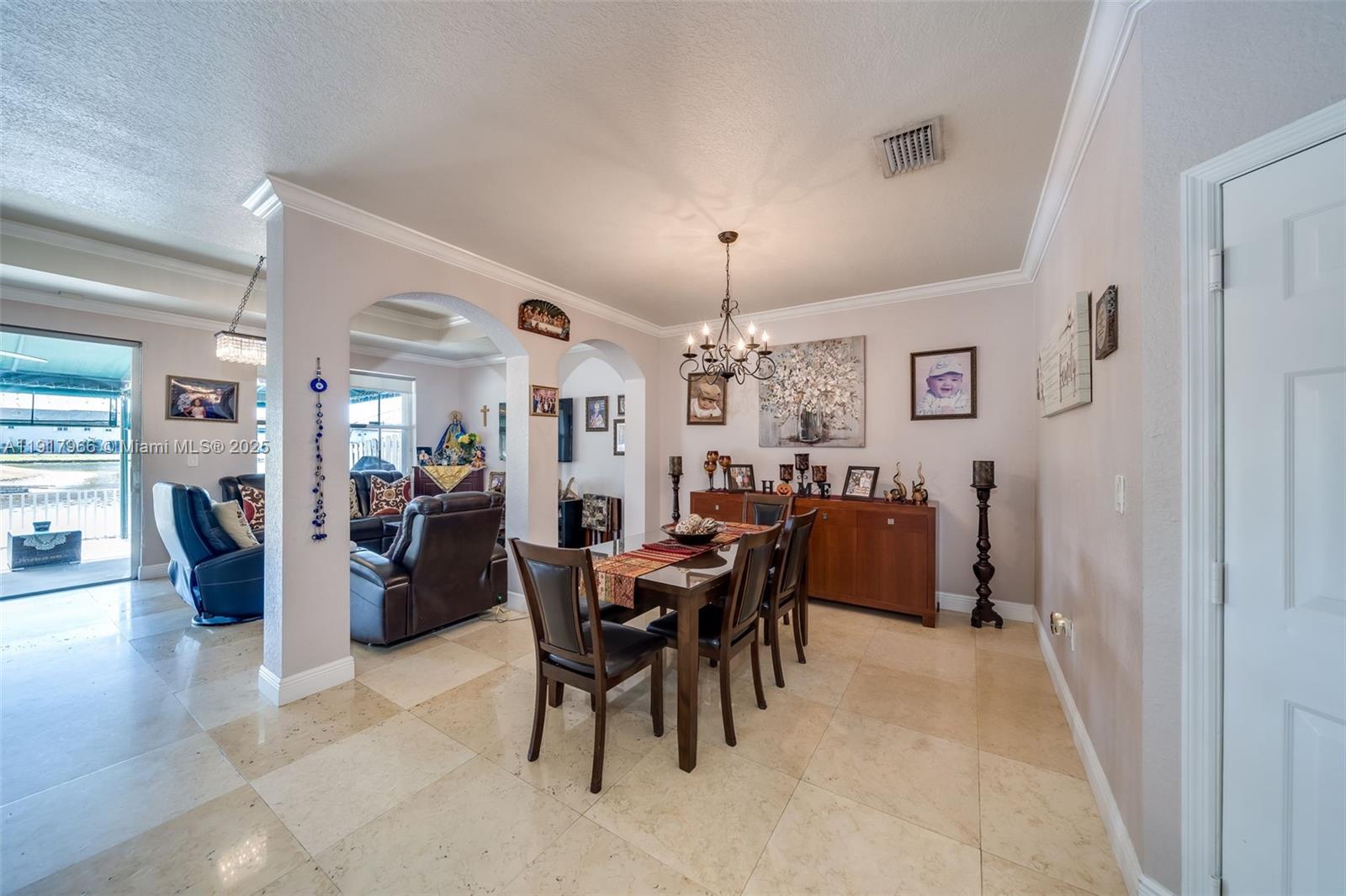 15242 Southwest 8th Way Miami, FL 33194 - Photo 8 of 62 a view of a dining room with furniture