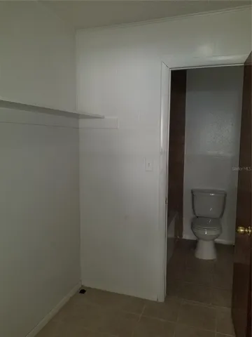 a bathroom with a toilet