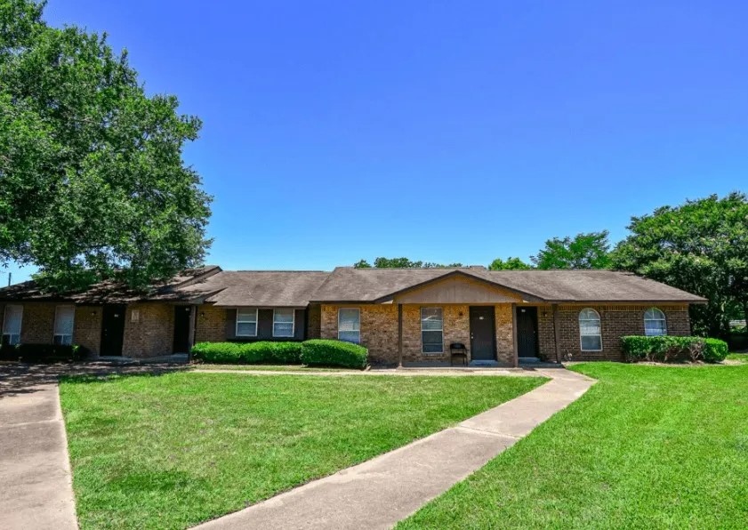 20598 Pine Island Road Hempstead, TX 77445 - Photo 2 of 8 a front view of a house with a yard