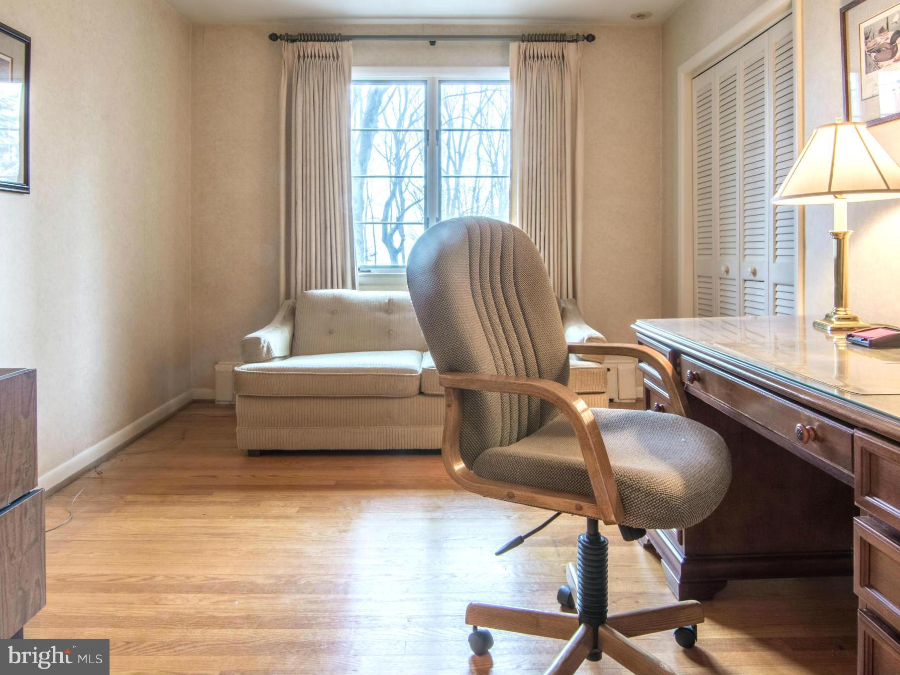 801 Huntsman Road Baltimore, MD 21286 - Photo 15 of 22 a living room with furniture and a window