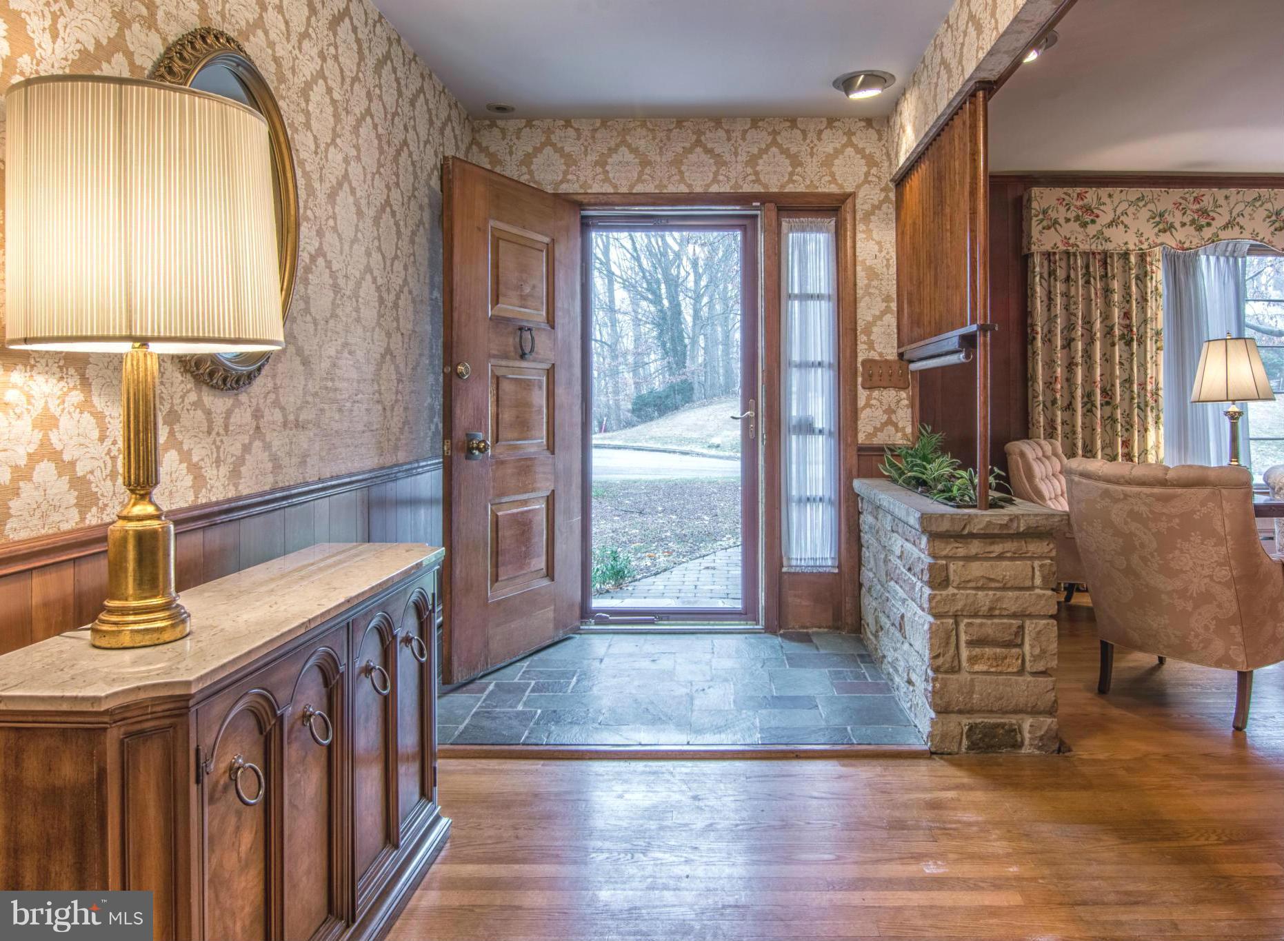 801 Huntsman Road Baltimore, MD 21286 - Photo 4 of 22 a view of a kitchen cabinets and entryway