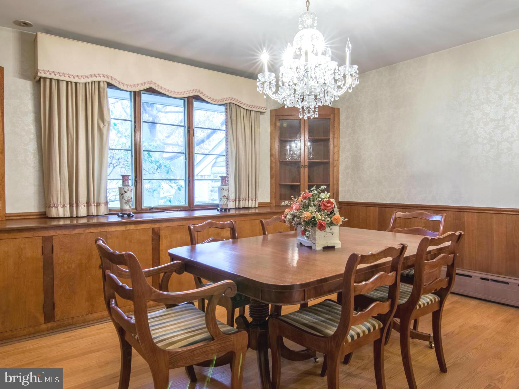 801 Huntsman Road Baltimore, MD 21286 - Photo 6 of 22 a view of a dining room with furniture and chandelier