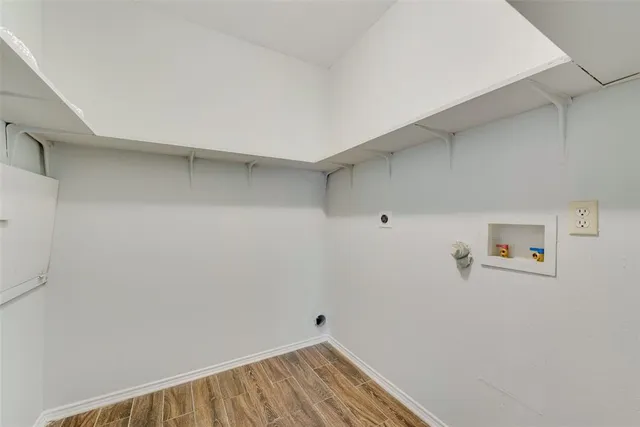 a view of small space with racks on the wall