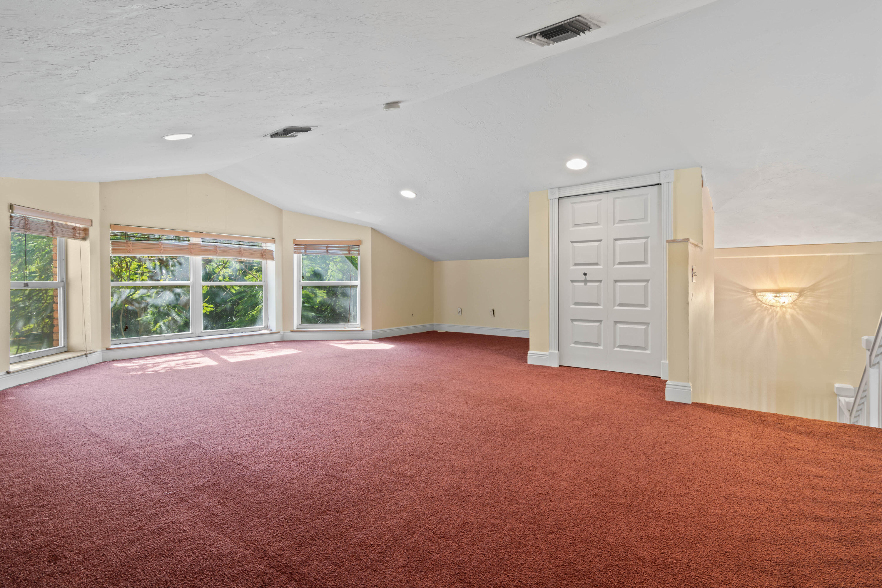 8850 Hidden Pines Road Fort Pierce, FL 34945 - Photo 14 of 72 a view of an empty room with a window