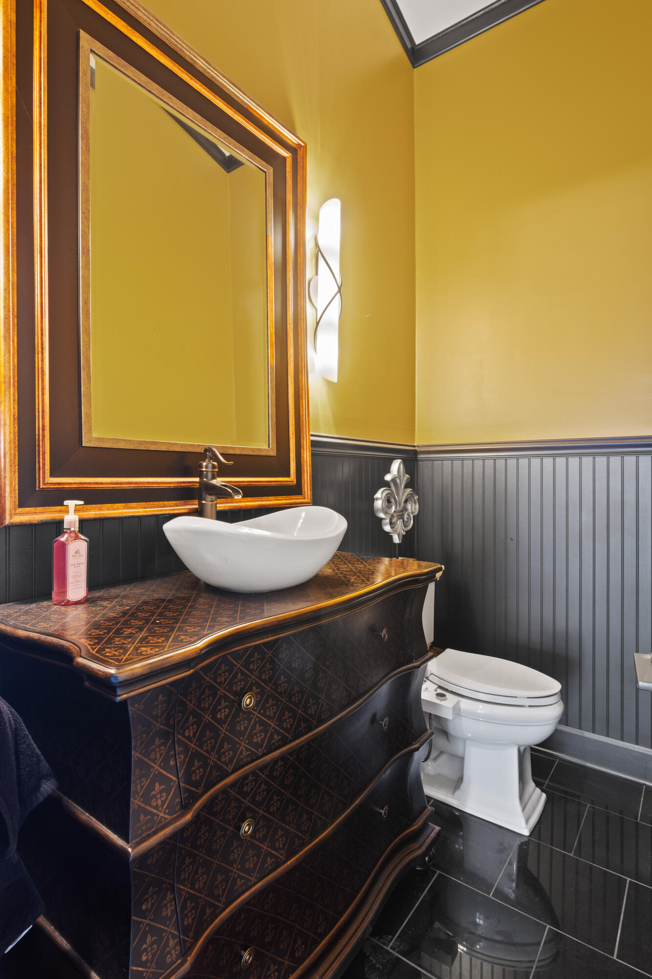 8850 Hidden Pines Road Fort Pierce, FL 34945 - Photo 30 of 72 a bathroom with a sink mirror vanity and toilet