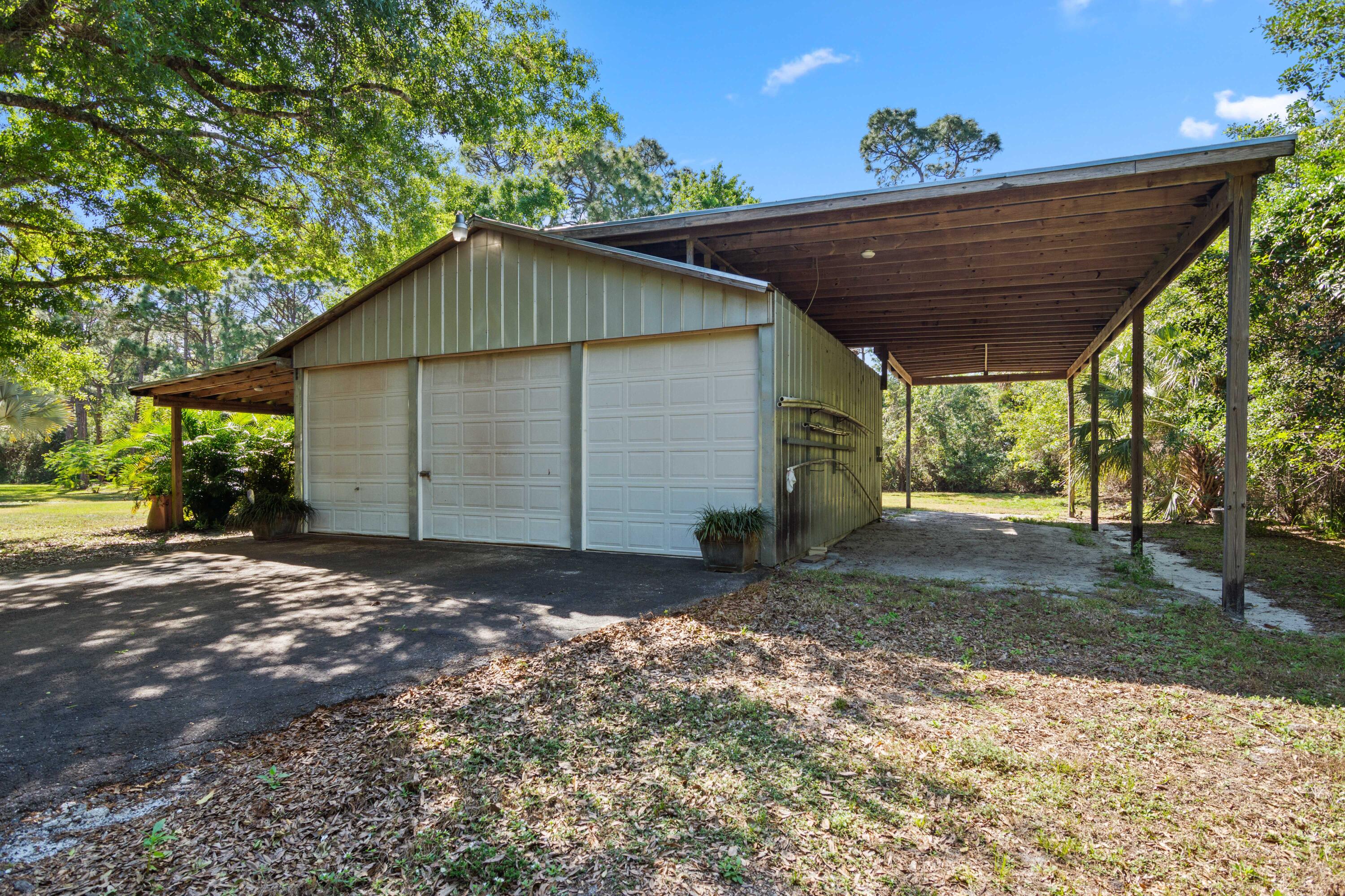 8850 Hidden Pines Road Fort Pierce, FL 34945 - Photo 53 of 72 a view of backyard of house